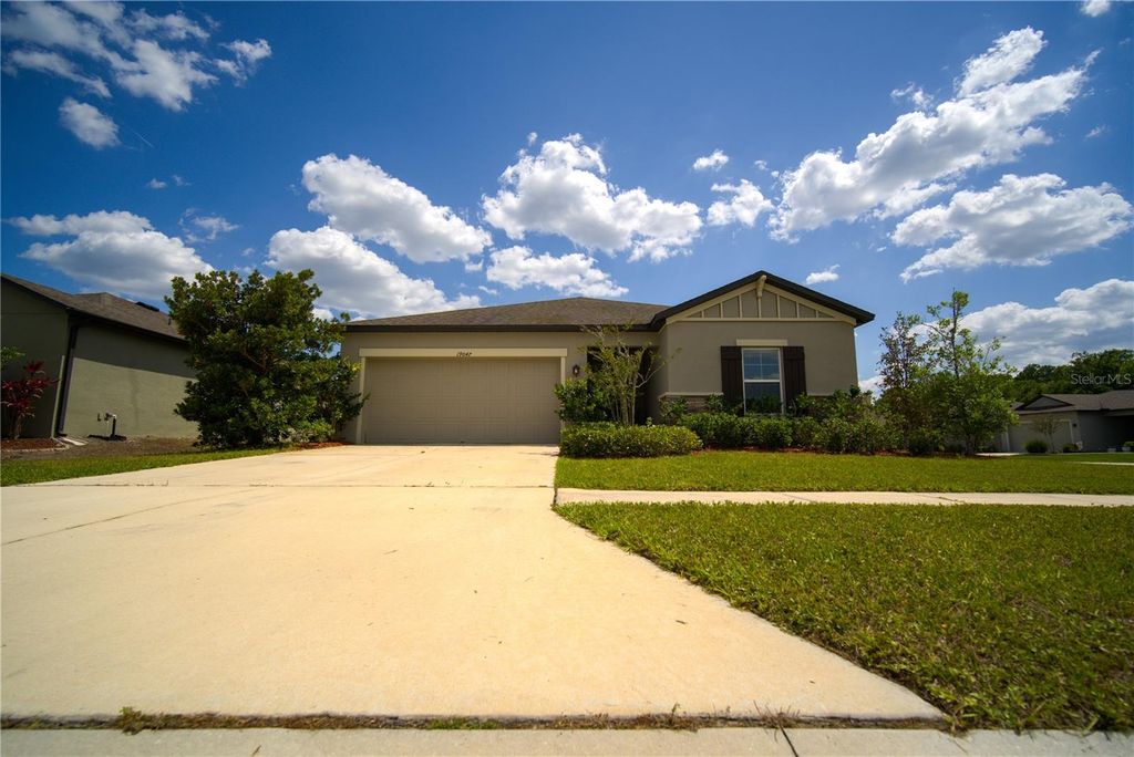 Photo of 19047 Alfaro Loop, Spring Hill, FL 34610 (MLS # TB8381822)