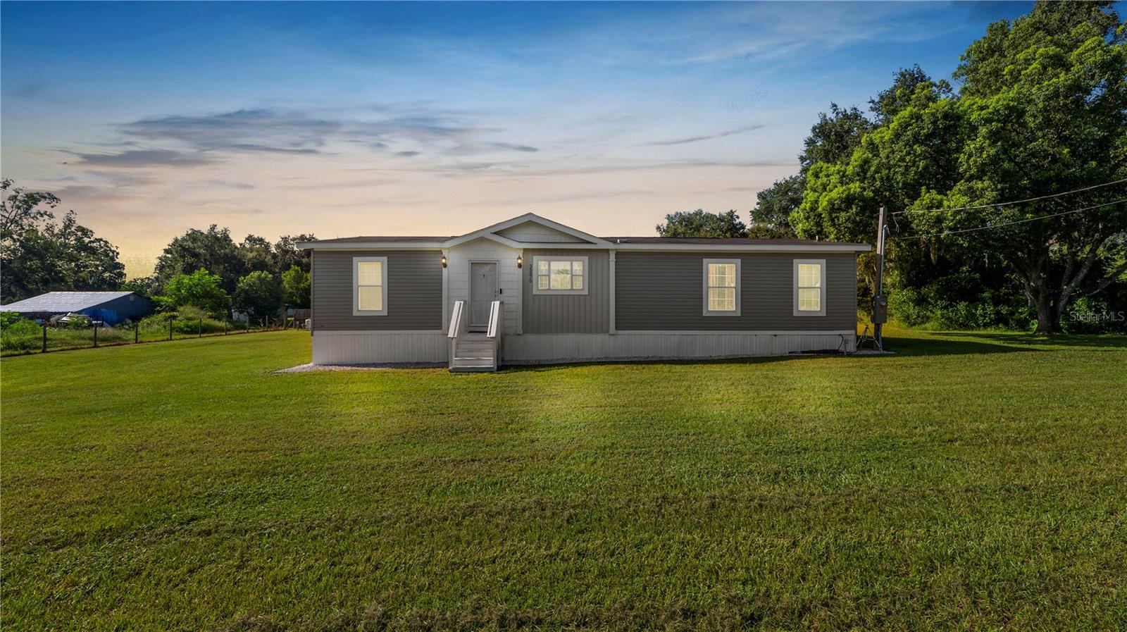 This charming home offers the perfect blend of comfort and convenience in a peaceful neighborhood. Step inside to find a bright and inviting living space with an open layout, perfect for both everyday living and entertaining guests. The kitchen features ample cabinet space and a functional design, making meal prep a breeze. The bedrooms are generously sized, providing plenty of room for relaxation, while the bathrooms are well-appointed for comfort and style. Outside, you’ll love the spacious yard — ideal for family gatherings, pets, or creating your own outdoor oasis. Located just minutes from shopping, dining, schools, and all the amenities Zephyrhills has to offer, this home combines small-town charm with everyday convenience.