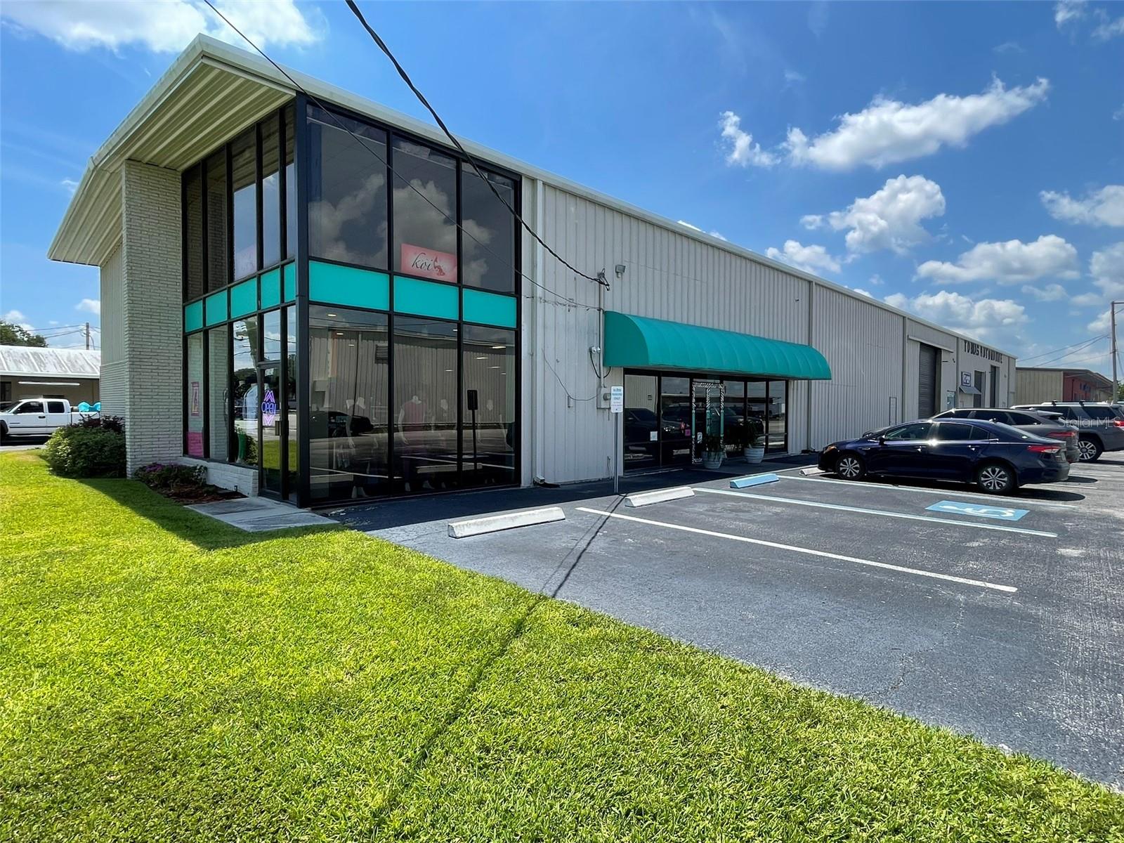 The commercial property located at 2121 Edgewood has undergone extensive renovations and offers a total of 10,000 square feet of office and warehouse space plus 1690 SF+/- of built out office and multi use space on the second-floor mezzanine. The property features a newer roof, high visibility from a busy road with over 18,000 cars passing daily and is situated within close proximity to US Highway 98 and the Polk County Parkway.
The building includes various modern amenities such as LED lighting, new flooring, pendant lights, under-counter lights, and motion detector lights. Additionally, the second-floor office space has been updated with new air conditioning, carpet, and LED lighting.
The property has a long-term tenant occupying 5000 SF who wishes to remain, providing a stable income source. Significant investments totaling $500,000 have been made in the building since 2018 to include;
Awning lights and motion detector lights
Pendant lights
Under counter lights
All three warehouse rollup doors
Warehouse fan
All new LED lighting
New Sign and Awning
Southside Second floor – new AC/carpet and LED lighting
New flooring
New insulation
Awning lights and motion detector lights
Pendant lights
Under counter lights
2018 New roof and gutters
2024 All three warehouse rollup doors
Warehouse fan
2018. All new LED lighting
New Sign and Awning
Southside Second floor – new AC/carpet and LED lighting
New flooring
New insulation
2023 and 2024 New windows -5
*All information, sizes and measurements are approximate and should be verified by Buyers and their Agents.