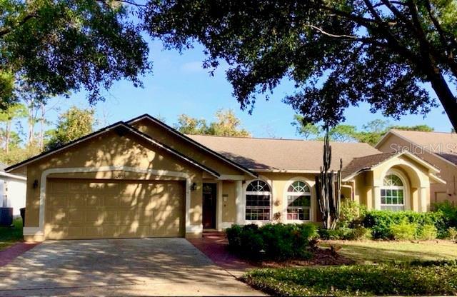 -Beautifully maintained 3-bedroom, 2-bathroom, home in East Orlando! The spacious open floor plan is filled with light and great for entertaining or family time. The large living room has laminate floors, large arched windows, and flows to the open kitchen-dining room. The kitchen has stone countertops, a dining bar, a gas stove and space for a breakfast table or dinette. The kitchen flows to a space that could be used as a formal dining room, home office or a bonus family room. The primary suite has an en suite bath that has a separate garden tub and walk-in shower, dual sinks, and an updated vanity. The second and third bedrooms share the hall bath. The home also offers a large two-car garage, full-size washer/dryer, covered front porch, large fenced backyard with a lovely screened porch and patio. Minutes to UCF, Lockheed Martin, Enovation Business Complex. Easy access to Highway 417 and 408 to easily get to Orlando International, Downtown Orlando, Orlando Health, Full Sail University, Research Parkway, Siemens, Seminole State College, Waterford Lakes Plaza and all of the amazing restaurants, shopping, entertainment and events! This is an HOA-restricted community, so they do not allow more than two unrelated roommates.
