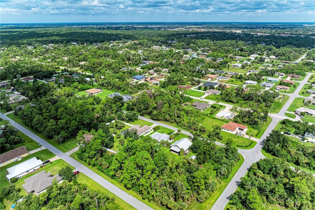 Photo of 15098 Gulistan Avenue, Port Charlotte, FL 33953 (MLS # TB8425696)