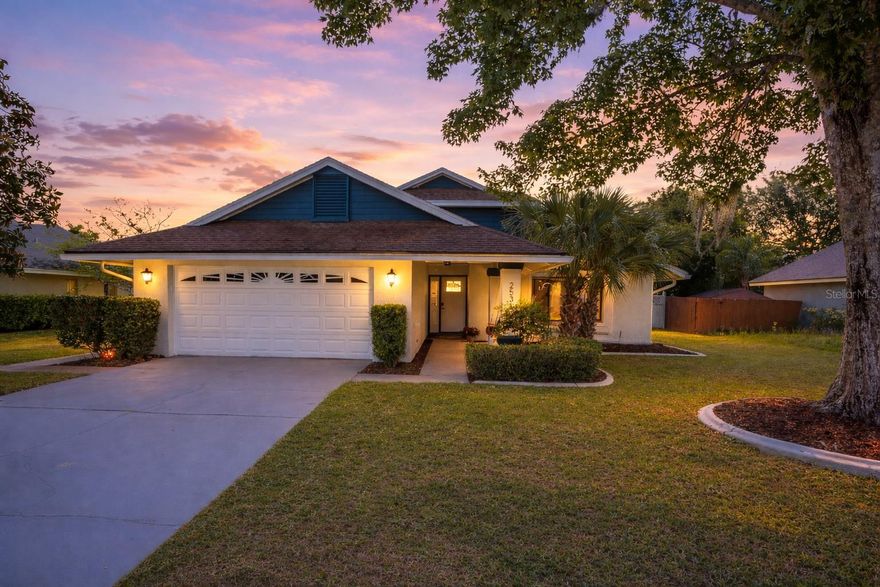 Welcome to this charming, UPDATED and character-filled 3-bedroom, 2-bath home. From the moment you step onto the covered porch and enter, you’re greeted by an open floor plan with vinyl floors (no carpet) bathed in natural light. A soaring vaulted ceiling crowns the family room, where a striking wood beam and a wood-burning fireplace create a cozy focal point. This space opens seamlessly into a beautifully updated kitchen, featuring stainless steel appliances, granite countertops, and tile backsplash. There’s ample space for a dining table, plus a raised breakfast bar for casual seating. The primary bedroom offers a peaceful retreat, complete with a walk-in closet and custom built-ins. Both renovated bathrooms exude modern elegance, with new fixtures, lighting, and sleek tile floors. An expansive Florida room—over 330 square feet—offers a versatile bonus space, NOT counted in the square footage. Step right out back to watch rocket launches!  You’ll love the convenience of an indoor laundry room (W&D included) with built-in cabinets as well as a large, fully fenced backyard—ideal for pets, play, or entertaining. The two-car garage features an epoxy floor and a workbench for added convenience. Garage door opener replaced after 2020 and My Q technology and video keypad added in 2025 for remote access and monitoring. An OPTIONAL HOA is available for just $50 a year, if you choose to join. Nestled right in the community, the Wedgefield Golf Club awaits, with an exceptional 18-hole, par-72 course that blends challenge and beauty. Outdoor lovers will adore the nearby Hal Scott Nature Preserve—over 9,000 acres for hiking, fishing, horseback riding, and more. The Orlando MX and Orlando Speedworld are minutes away with the Snow Hill Mountain bike trails about 20 min away.  And with just a 30-minute commute to downtown Orlando, or a short drive to the beaches in Cocoa and Melbourne, you’ll have the best of both worlds. Don’t miss out on this unique, inviting oasis! Roof 2016, hot water heater 2018, and HVAC 2012—come see for yourself!