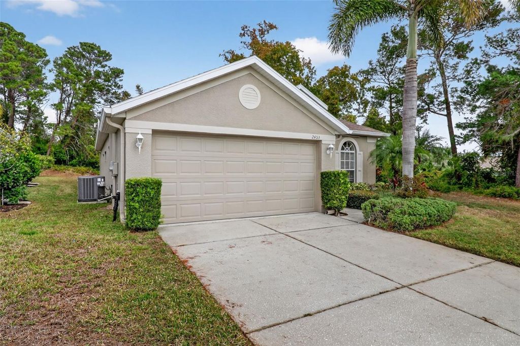 Photo of 2453 Pleasant Hill Lane, Holiday, FL 34691 (MLS # O6364058)