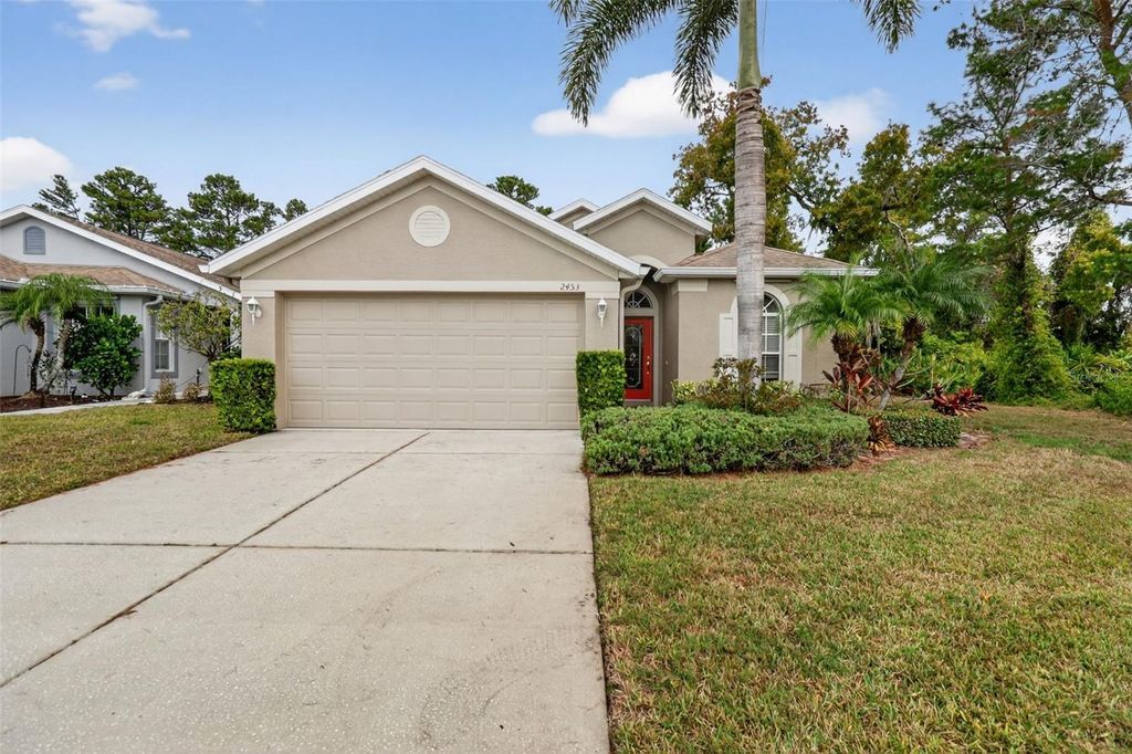 Photo of 2453 Pleasant Hill Lane, Holiday, FL 34691 (MLS # O6364058)