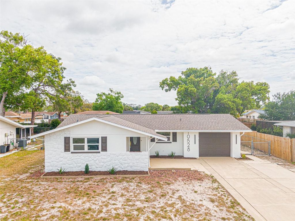 Photo of 10528 Cymbid Drive, Port Richey, FL 34668 (MLS # W7884471)