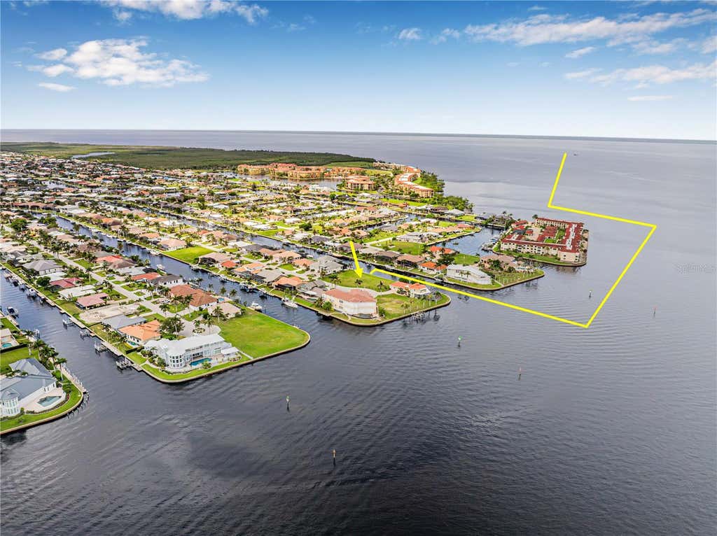 Photo of 5 Tropicana Drive, Punta Gorda, FL 33950 (MLS # C7528980)