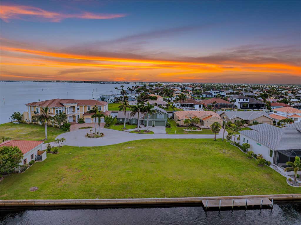 Photo of 5 Tropicana Drive, Punta Gorda, FL 33950 (MLS # C7528980)