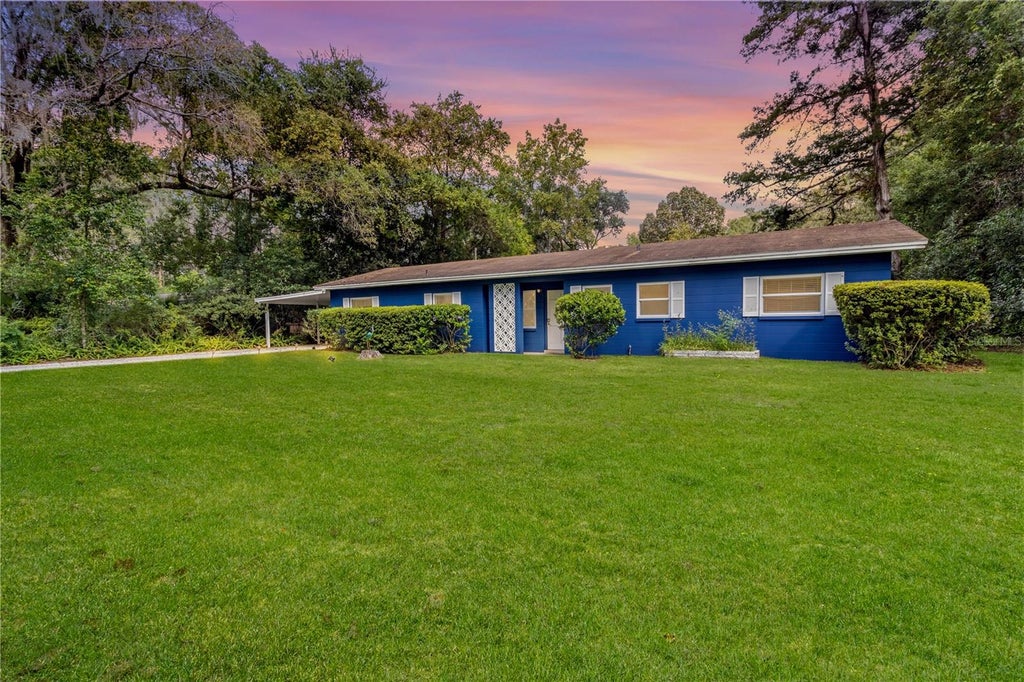 Photo of 3850 NW 16th Place, Gainesville, FL 32605 (MLS # TB8526592)