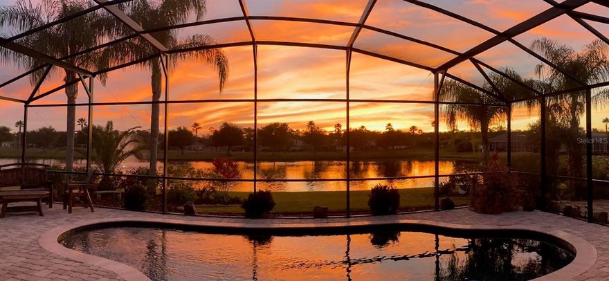 This beauty shows like a model with breathtaking water views from the time you walk into the home and throughout the house.
Everything is new in this house with porcelain tile plank woodgrain floors, new custom gourmet kitchen with numerous cherry cabinets with self close drawers all with slider shelves, pantry, custom cabinets above the stove designed for oils and spices,
upgraded granite countertops, high quality pop-up outlets, touch faucet, built in computer desk and storage as well as top of the line dark stainless steel GE profile appliances including wine cooler. Breakfast bar and breakfast nook for the quick meal and formal dining room for cozy dinner or large family events.
Large open floor plan allows full views of the gorgeous 2018 self cleaning heated pool with pavers and full sunscreens for the lanai area and full view of the large lake with fountain and real ducks! A 19x13 private sanctuary firepit area with archway into a peaceful garden for quiet times. Full length accordion shutters for lanai to protect from storms and high winds. Lush yard with numerous tropical plants and palms add to the beauty of this home with stone curbing surrounding the house for easy maintenance.
New roof with 2 new solar attic fans and 2 new sun tunnels to add light and new A/C makes this home economical and efficient. This carefree home is perfect for second home or full time residents with all of the amenities for an active life style in one of the Premier communities on the east coast of Florida with 18 hole Championship golf course, miles of walking and biking trails, Olympic size pool, swim club, fitness center and Town Center with shops and restaurants all only 11 miles to the beach and 70 miles to Orlando and the parks, This is truly a Must See Home!!! ;Water: City