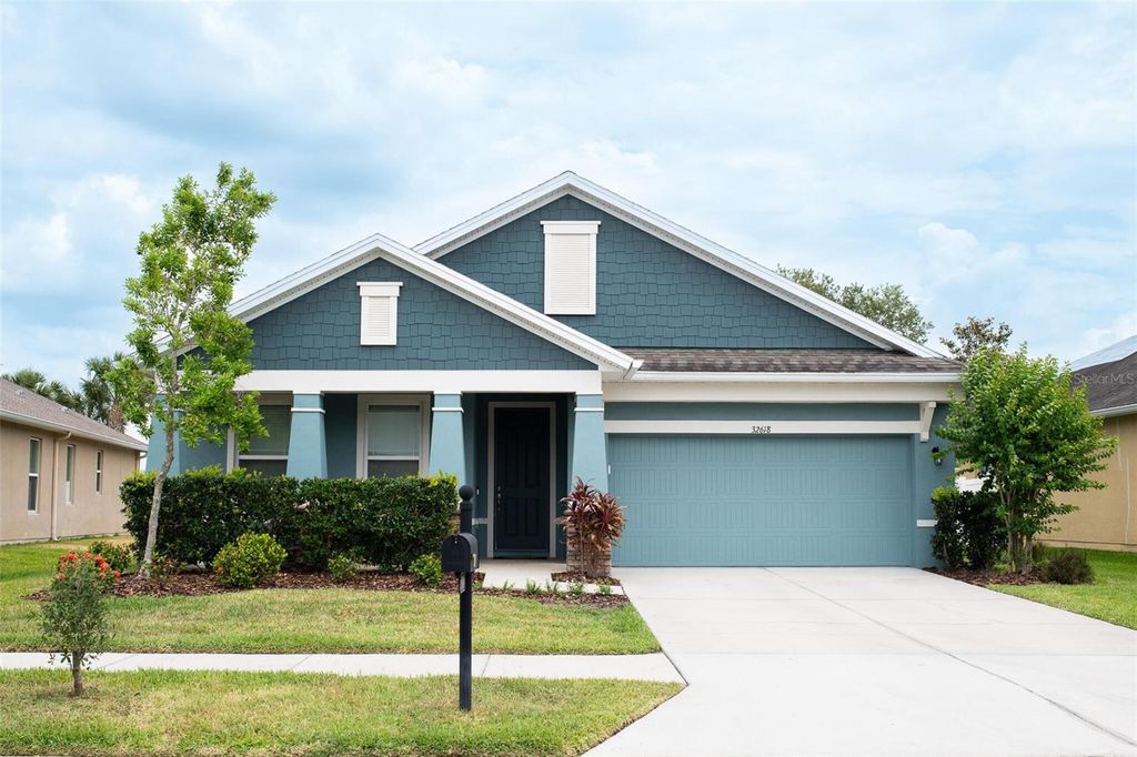 Photo of 32618 Rapids Loop, Wesley Chapel, FL 33545 (MLS # O6306320)