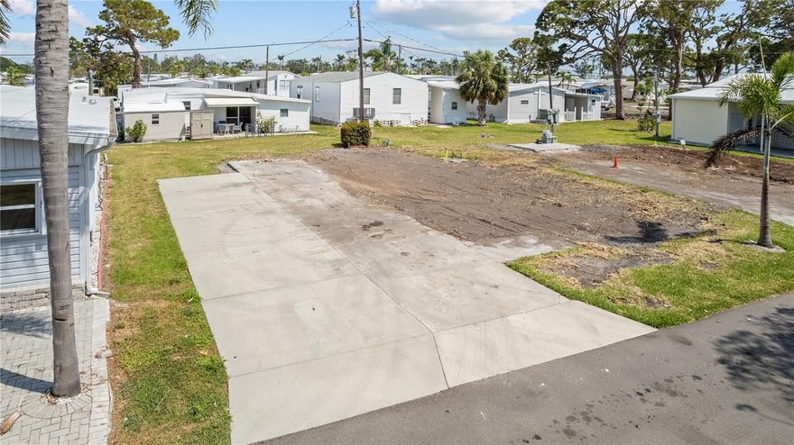Welcome to a rare opportunity to own a vacant lot in a well-maintained, active 55+ community—perfectly suited for your future manufactured or mobile home. Placed in a quiet and friendly neighborhood, this spacious lot offers a blank canvas to design the retirement retreat you've always envisioned.  Located only minutes from the stunning island of Anna Maria where you can experience unforgettable sunsets, dining, boating, shopping and much more. 
Enjoy the benefits of low-maintenance living with access to community amenities such as a clubhouse, swimming pool, shuffleboard courts, tennis courts and planned social activities. Whether you're looking to settle down full-time or create a seasonal getaway, this location offers convenience, comfort, and community.