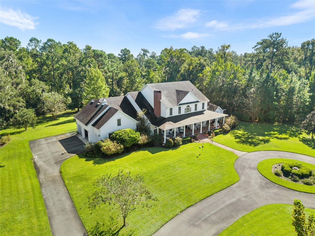 Photo of 9691 NW 53rd Drive, Gainesville, FL 32653 (MLS # GC544109)