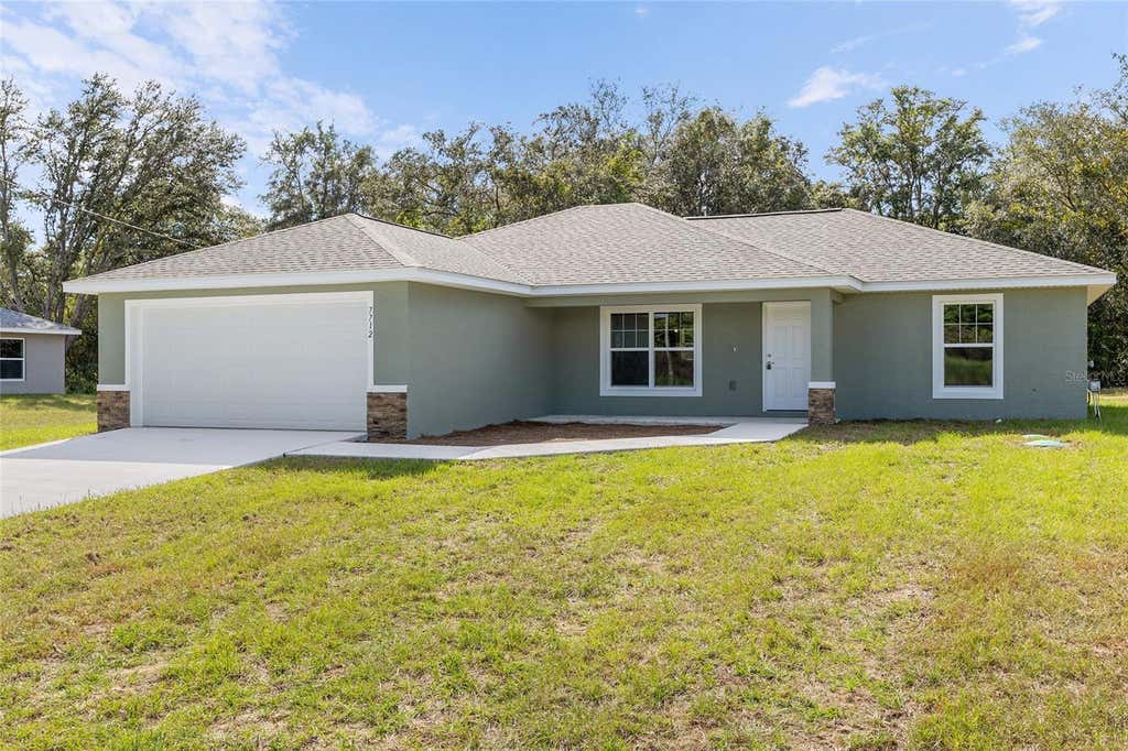 Photo of 8955 SW 139th Street, Ocala, FL 34473 (MLS # OM727373)