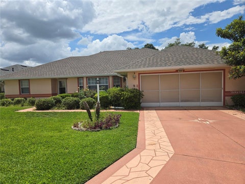 Photo of 5506 Prince Charles Lane, Leesburg, FL 34748 (MLS # O6416308)