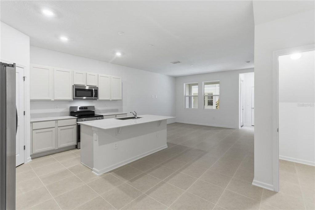 Photo of 3447 Beam Terrace, Davenport, FL 33837 (MLS # O6375424)