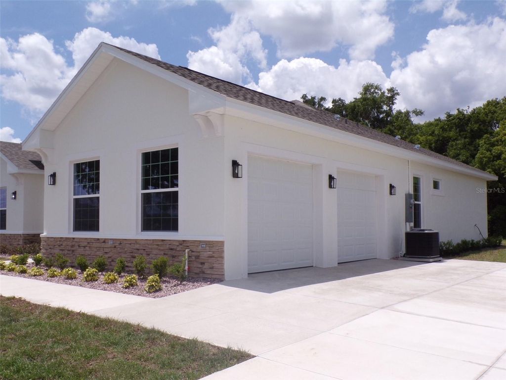 Photo of 1970 NW 79 Loop, Ocala, FL 34475 (MLS # OM723749)