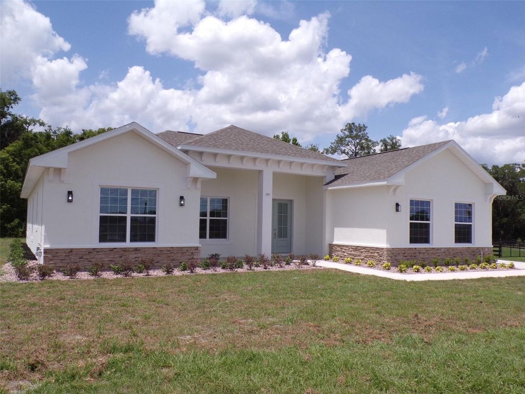 Photo of 1970 NW 79 Loop, Ocala, FL 34475 (MLS # OM723749)