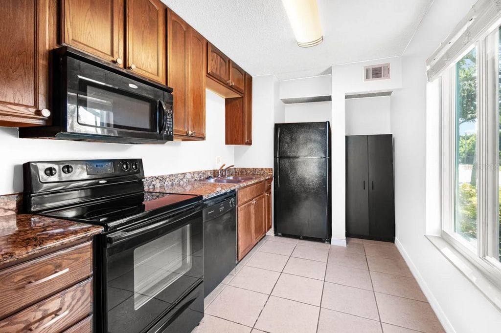 Photo of 11400 3rd Street N #1, St Petersburg, FL 33716 (MLS # TB8438158)
