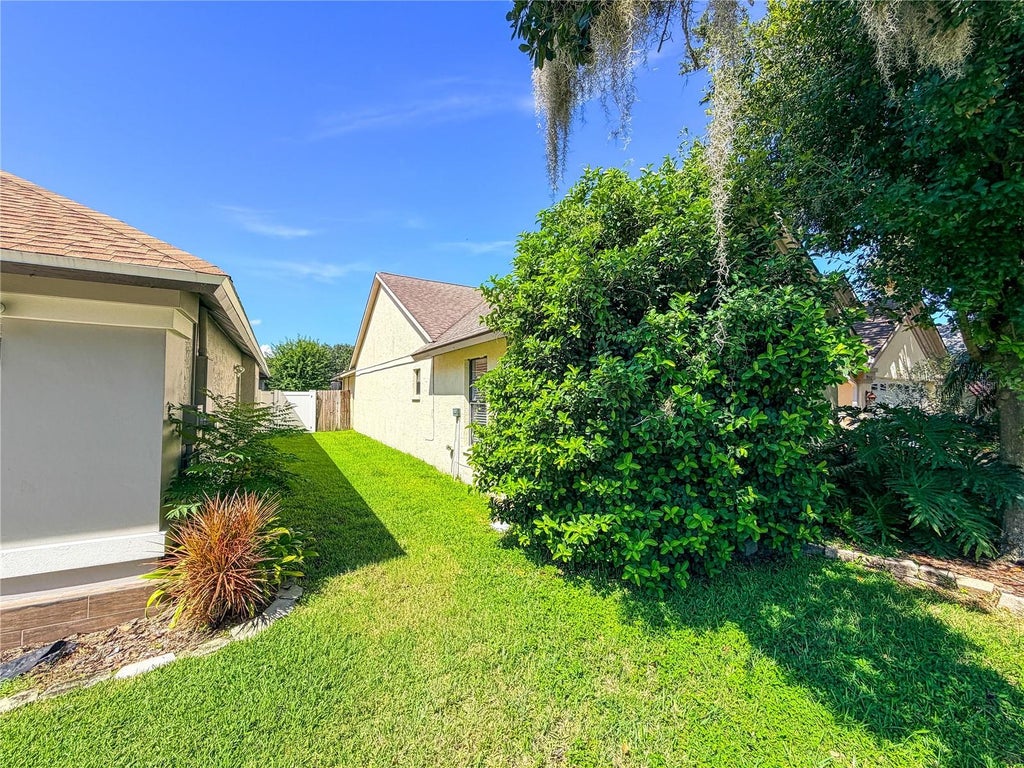 Photo of 9542 Pebble Glen Avenue, Tampa, FL 33647 (MLS # W7889088)