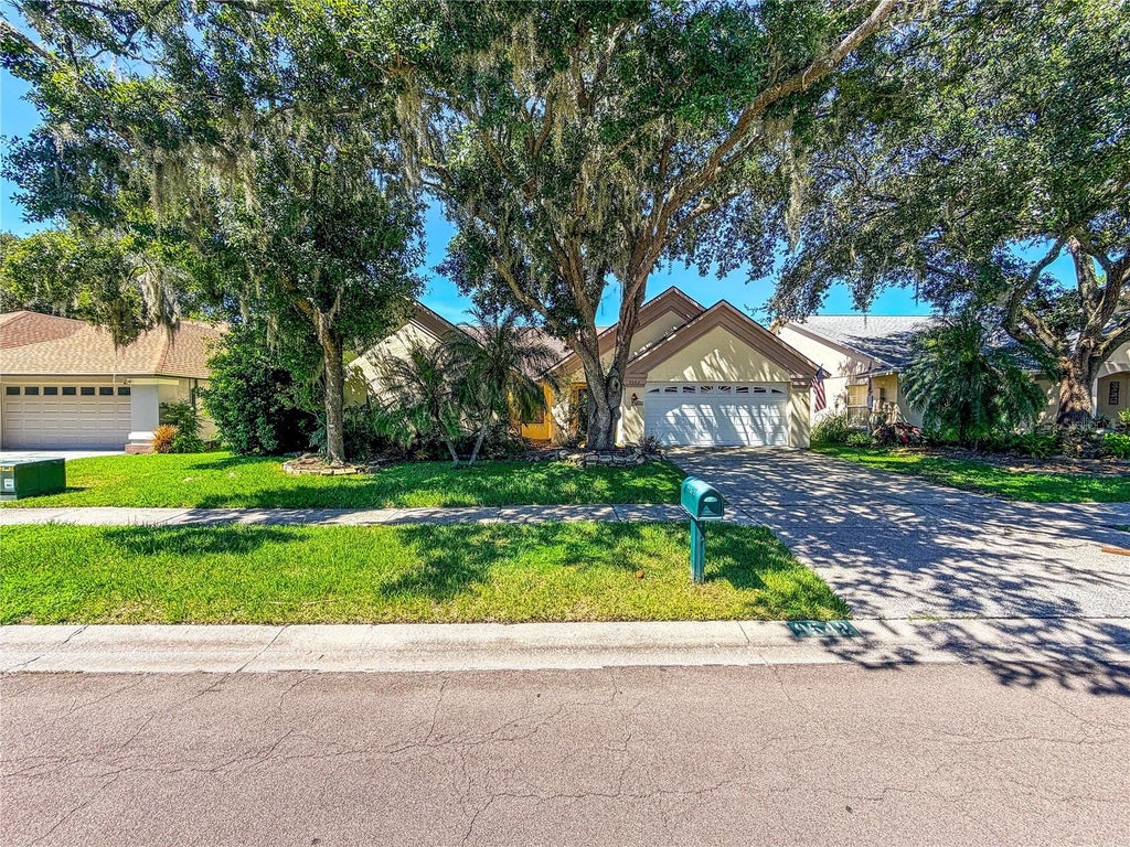 Photo of 9542 Pebble Glen Avenue, Tampa, FL 33647 (MLS # W7889088)