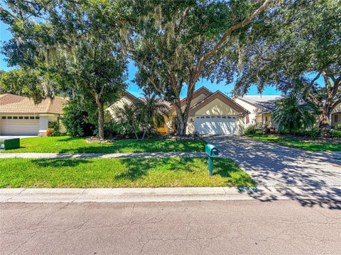 Photo of 9542 Pebble Glen Avenue, Tampa, FL 33647 (MLS # W7889088)