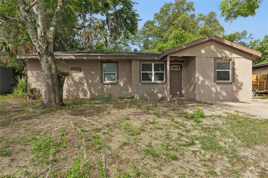 One or more photo(s) has been virtually staged. Welcome to 540 Colfax Dr in Daytona Beach! This charming 3-bedroom, 2-bath home offers a bright and comfortable layout with plenty of natural light throughout. The bedrooms feature new flooring, and the home also offers new windows, an inside laundry room, and a new A/C installed in 2025. The roof is approximately 10 years old and still has useful life remaining. Enjoy Florida living from the screened and covered back porch, overlooking a spacious fenced backyard with plenty of room to relax, play, garden, or entertain. A concrete side patio provides the perfect spot for grilling, chilling, or creating an outdoor seating area. The lot is high and dry and not located in a flood zone, adding extra peace of mind. Conveniently located near shopping, dining, schools, major roadways, and just a short drive to Daytona Beach, this home is a great opportunity for homeowners or investors alike!