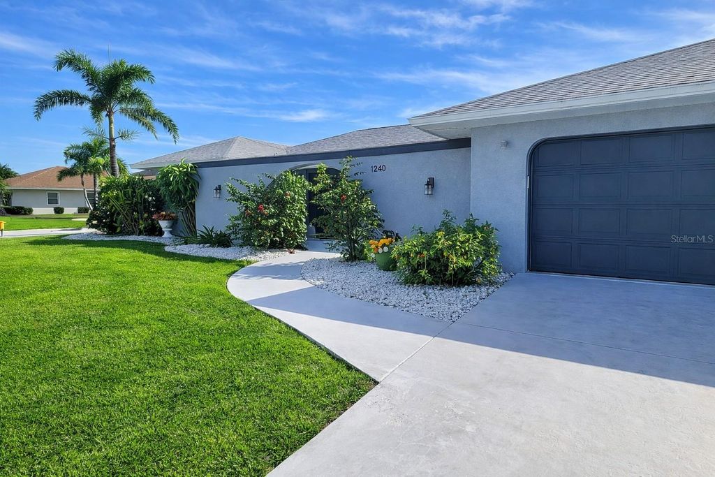 Photo of 1840 Flametree Lane, Venice, FL 34293 (MLS # O6370179)
