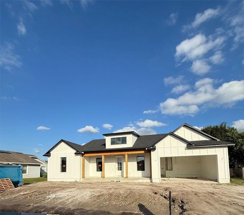 Photo of 6465 Bay Shore Drive, Saint Cloud, FL 34771 (MLS # TB8442893)