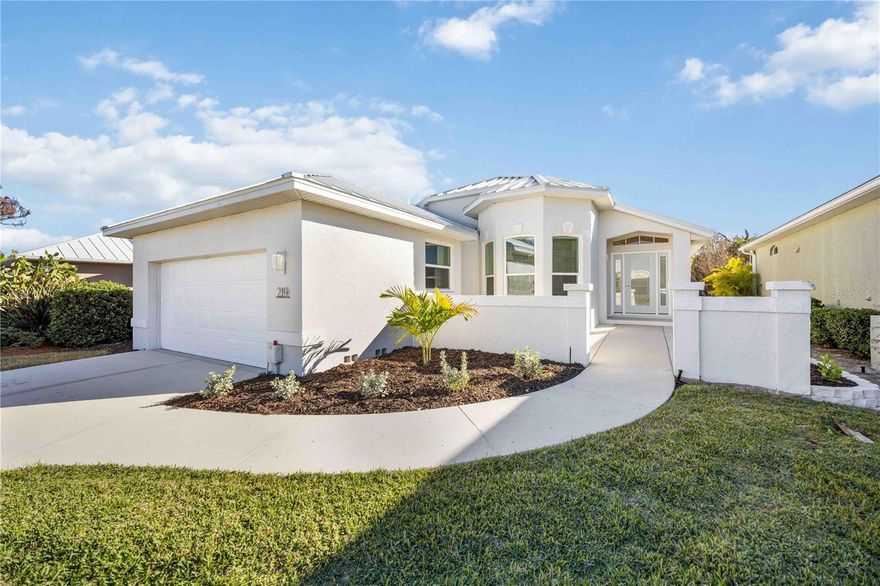 Experience care-free living near Boca Grande in the sought-after community of Cape Haze Windward. Major updates include a 2024 STANDING SEAM METAL ROOF with secondary waterproof underlayment, 2023 IMPACT WINDOWS AND NEW Thermatru IMPACT FRONT DOOR, 2024 water heater and 2021 HVAC system—delivering peace of mind and long-term efficiency. Modern curb appeal welcomes you with a freshly painted exterior, new landscaping and a charming front courtyard; the perfect space for a bistro set and afternoon chats with friendly neighbors. Once inside, the home offers plenty of additional entertaining space with a vaulted ceiling great room with wet bar and formal dining along with a well-sized kitchen and additional dinette space. Three sets of POCKETING SLIDING DOORS open up to the screened-in pool area to create an expansive indoor/outdoor flow – the perfect way to enjoy Florida weather. Appreciate the SOLAR-HEATED POOL with a PRIVATE, WOODED GREENBELT BACKDROP, PLUS a SECLUDED SPA area in its own screened enclosure just off the primary suite—perfect for creating a secret garden or soaking sanctuary. The primary bedroom also features pool views, a spacious walk-in closet and ensuite bath with dual sinks while the second bedroom is tucked away on the opposite side of the home for privacy and convenient access to the second, full guest bathroom. This section of "patio homes" benefit from their additional HOA WHICH INCLUDES LAWN MOWING, shrub trimming, weed/pest control, reclaimed water for irrigation and limited sprinkler system maintenance. For the avid golfer, Cape Haze Links is one street over with several other premier courses nearby while the nature lover will appreciate proximity to Boca Grande beaches, Manasota Key and an array of state parks with walking trails and kayak launches. Call today to learn more about this charming Peninsula and see why so many residents are proud to call Cape Haze Windward home!