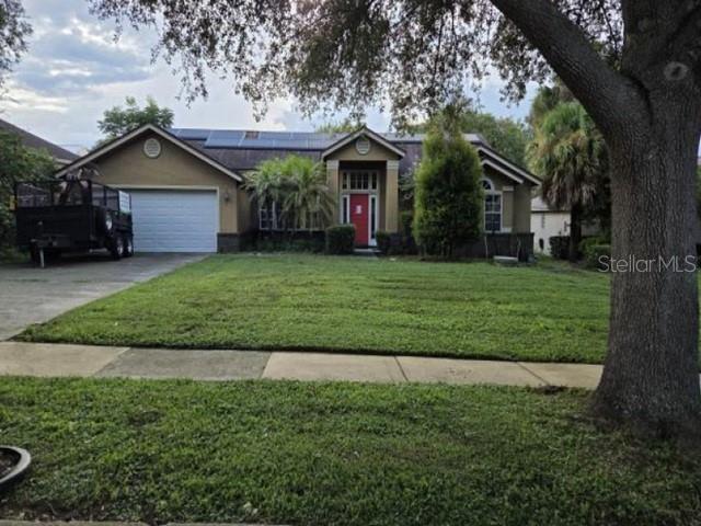 Photo of 1368 Countryridge Place, Orlando, FL 32835 (MLS # O6442126)