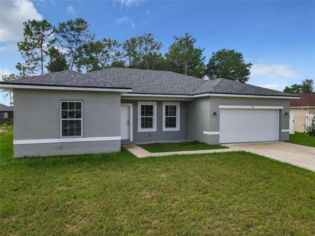 Photo of 406 Marion Oaks Trail, Ocala, FL 34473 (MLS # O6373446)