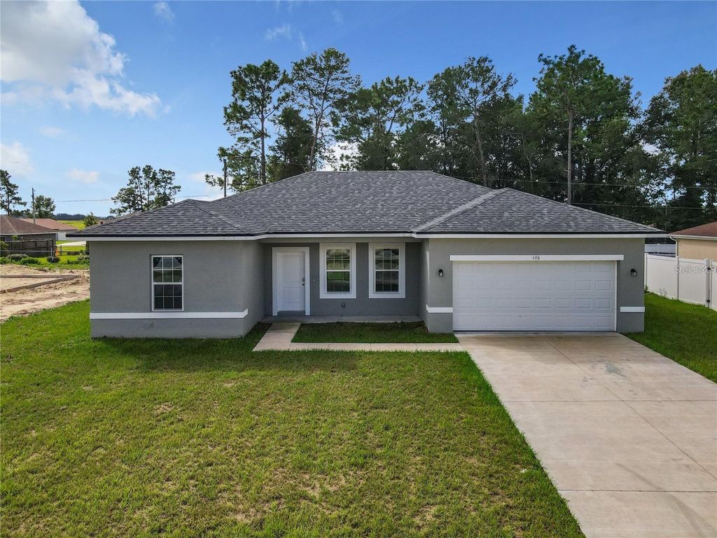 Photo of 406 Marion Oaks Trail, Ocala, FL 34473 (MLS # O6373446)