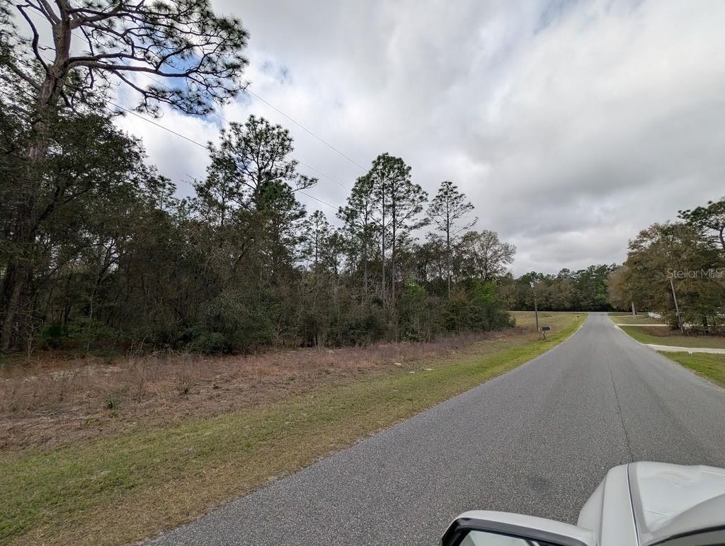 Photo of 6200 SW 128th Terrace Road, Ocala, FL 34481 (MLS # OM723160)