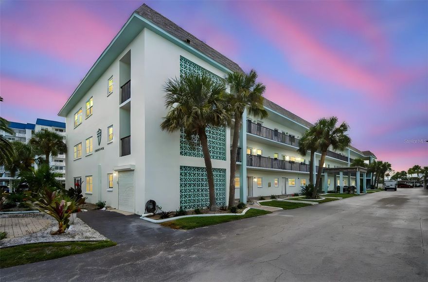 Beautifully updated and ideally positioned along the Dunedin Causeway next to world-famous Honeymoon Island State Park, this 2-bedroom, 1-bath retreat offers 1,100 sq. ft. of modern comfort and coastal charm. From both sides of the condo, you can take in sparkling Gulf views, enhancing the coastal lifestyle that surrounds you. Inside, recent upgrades include new laminate flooring throughout, a refreshed kitchen with new appliances and pantry storage, and a stylish bath with double vanities and a tiled tub/shower combination. The open living and dining area flows into a versatile Florida room, perfect for relaxing or entertaining.

This vibrant 55+ community provides resort-style amenities, including a fishing pier, heated pool, sauna, steam room, fitness center, tennis and pickleball courts, and shuffleboard. Residents also enjoy a lively social calendar and easy access to the Pinellas Trail for biking and walking. With downtown Dunedin, Clearwater, St. Petersburg, and Tampa just minutes away, the location couldn’t be more convenient.

And right at your doorstep, Honeymoon Island—one of Florida’s most beloved beaches—invites you to enjoy sugar-sand shores, nature trails, and breathtaking Gulf sunsets. This home truly offers the perfect blend of views, lifestyle, and comfort.