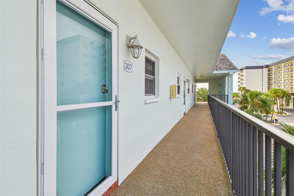 Photo of 8 Glencoe Place #307, Dunedin, FL 34698 (MLS # TB8427811)