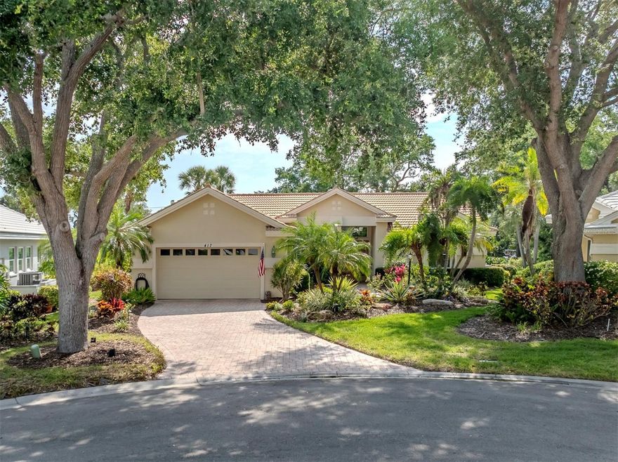 Experience the exceptional lifestyle of the Venice Golf and Country Club in this beautiful residence ideally positioned on a quiet cul-de-sac with breathtaking views of the pond, golf course and protected preserve beyond, without another home behind you. Enjoy carefree living, as this home is in a maintained neighborhood, plus a golf membership opportunity is available as well. Lush tropical landscaping, a brick paver driveway and walkway and double-etched art glass entry doors create an elegant first impression. Inside, neutral 20-by-20-inch tile flooring flows throughout the living areas and den. The spacious great room is designed for seamless indoor-outdoor living, with four sliding glass doors opening to the partially covered, fully screened lanai complete with serene water and golf course views and a Storm Smart screen. High ceilings, crown molding and ceiling fans add to the home’s refined appeal. The light-filled kitchen features white cabinetry, quartz countertops and backsplash, breakfast bar seating and an adjoining dinette with cathedral ceilings and bay windows overlooking the picturesque setting. The primary suite is a peaceful retreat offering plantation shutters, crown molding, a large walk-in closet and an en-suite bath with dual sinks, a vanity area, a garden tub, a glass-enclosed shower and a private water closet. Two guest bedrooms share a Jack-and-Jill bath, while double pocket doors open to a versatile den with a built-in desk, cabinetry and shelving. Additional features include a well-equipped laundry room with a washer, dryer, cabinetry and utility sink, plus a two-car garage. The Venice Golf and Country Club has been recently reimagined. The expanded clubhouse features a spacious gathering bar, gourmet and commercial kitchens and a cozy fire pit. Members enjoy casual and special event dinners throughout the year. The new state-of-the-art wellness center offers massage therapy, fitness classes, yoga, physical therapy and personal training that provide a holistic approach to health and well-being. The beautifully renovated Ted McAnlis-designed 18-hole championship golf course is treasured and highly rated as one of the best and well-maintained golf courses in the region. Residents also enjoy Har-Tru tennis courts, bocce ball and a junior Olympic-sized pool and spa, balancing active living with relaxation. As a Geo-Certified Audubon Cooperative Sanctuary, VGCC embraces environmental stewardship and sustainability. With an A+ financial rating, the community is as solid as it is serene. Ideally just minutes from airports, shopping, dining, Interstate 75, cultural venues and Wellen Park is this charming home. It's also a short drive to the treasured Venice Island, where 14 miles of pristine beaches meet the sparkling Gulf Coast.