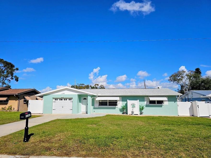 Welcome to "Paradise Found", located in the heart of Seminole. High & Dry no flood zone. This beautifully updated two-bedroom, two-bath home is in mint, move-in-ready condition and can be sold completely furnished, making it ideal as a turnkey short-term vacation rental or a perfect retirement home.
The home has been completely updated throughout, featuring gray shaker-style wood kitchen cabinets, granite countertops with a center island, and a classic subway tile backsplash. Enjoy updated windows, blinds, and doors, along with pendant and recessed lighting throughout. The kitchen is equipped with a new stainless Whirlpool appliance package.
Additional upgrades include new ceiling fans with lights in every room, luxury vinyl wood flooring, a new water softener system, and a 2019 Trane central heat and air system. The 2020 architectural three-dimensional shingle roof adds peace of mind. An all-new irrigation system services the lawn and garden, and the garage is climate-controlled. There are no popcorn ceilings, and both bathrooms have been fully updated.
Outdoor living is a pleasure with a screened-in lanai, fenced backyard, and continuous pavers surrounding the home, perfect for entertaining.
This prime location puts you just steps from the 47-mile Pinellas Trail, Seminole Tennis Courts, and Seminole City Park. The new Seminole City Center—with shops, restaurants, a movie theater, and outdoor entertainment—is only minutes away. You’re also close to Boca Ciega Millennium Park, a stunning 186-acre nature preserve, and just minutes from the white sandy beaches of the Gulf of Mexico.
Plant your feet in the sand and start living the Florida lifestyle.