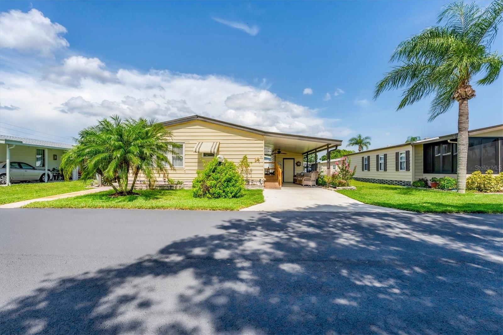 LOW HOA, NO LOT RENT AND SHARE OWNED! Priced to sell and full of potential, this 2-bedroom, 2-bath double-wide in the sought-after Gold Tree Co-Op 55+ community offers affordable Florida living in a resident-owned, amenity-rich neighborhood.
This light and bright home features an open layout with multiple living areas and a great location directly across from the clubhouse and recreational facilities. Recent updates include luxury vinyl plank flooring and renovated bathrooms—the hall bath has been beautifully updated, and the primary en suite has also been refreshed for added comfort.
The kitchen provides generous cabinet space and flows into the dining and family room areas, offering a flexible layout for everyday living or entertaining. The primary bedroom includes wood flooring, a built-in closet, and a walk-in shower.
Outside, you'll appreciate the large covered carport, a spacious storage shed, and the washer and dryer located in the utility area.
Gold Tree Co-Op is a gated 55+ community known for low monthly fees and outstanding amenities: heated pool and spa, fitness center, tennis and pickleball courts, bocce ball, shuffleboard, clubhouse activities, and more. The monthly fee includes water, sewer, trash, cable, internet, and grounds maintenance.
Located near shopping, dining, I-75, and just a short drive to the world-renowned beaches of Sarasota and Bradenton.
This unbeatable price won’t last—schedule your private showing today and discover the lifestyle that Gold Tree has to offer!