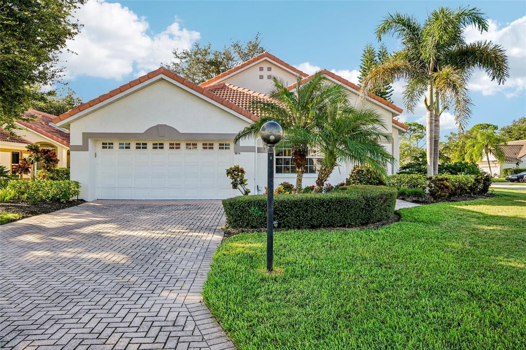 Photo of 5814 Fairwoods Circle, Sarasota, FL 34243 (MLS # A4707067)