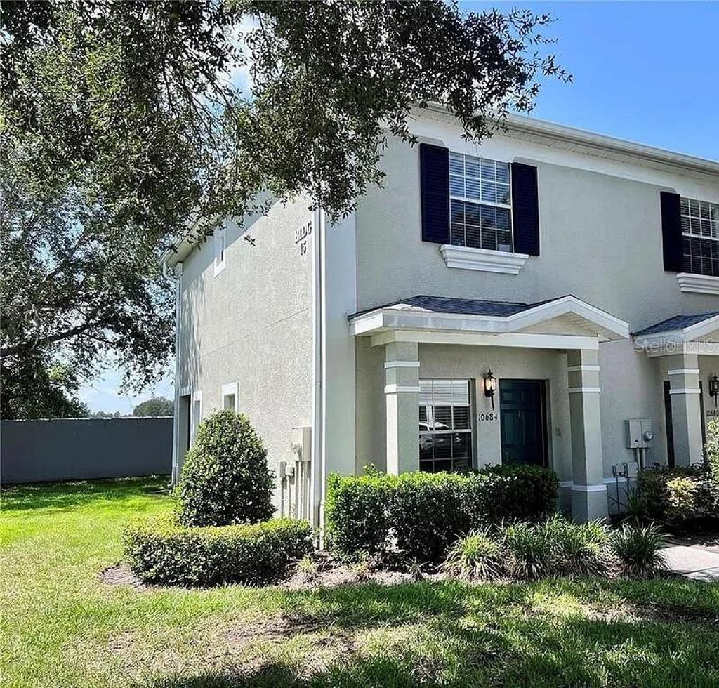 Photo of 10684 Savannah Wood Drive #104, Orlando, FL 32832 (MLS # O6367890)