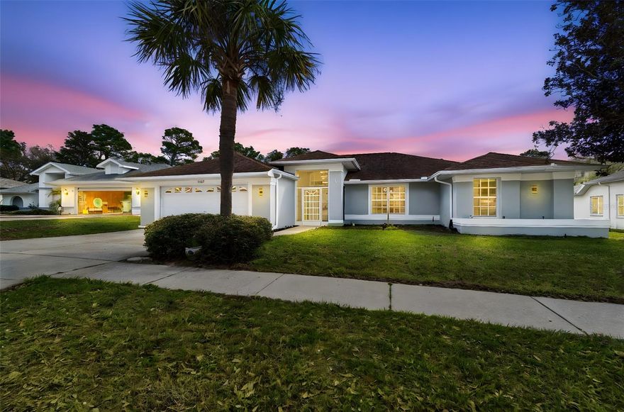 Welcome to this fully renovated 3-bedroom, 2.5-bath pool home for rent in the desirable Seven Hills community. This modern residence offers high-end finishes, smart-home features, and a low-maintenance lifestyle with pool service and lawn care included! The interior features a contemporary open layout with uniform 24x48 marble-finish ceramic tile flooring throughout. The gourmet kitchen includes Samsung smart appliances, an exterior-vented range hood, touch-latch cabinetry, a hidden coffee bar with built-in outlets, and a waterfall island with seamless Calacatta quartz countertops, storage on both sides, and pop-up USB/power outlets. Additional interior upgrades include integrated LED lighting, a whole-home water filtration system, modern fixtures, a tankless electric water heater, and a whole-home generator powered by gas and propane. The indoor laundry room is equipped with Samsung smart washer and dryer. The primary suite offers a stand-alone soaking tub, walk-in shower, and a smart toilet with heated seating and motion-sensor flushing. A second sink can be added if desired. A convenient half bath with direct pool access enhances outdoor living. The exterior features a large solar-heated pool with a newly screened enclosure, a covered lanai with ceiling fans, and a fenced dog run. With no rear neighbors, the property offers added privacy. A new 8-zone sprinkler system maintains the landscaped yard, and the oversized 2-car garage includes attic storage. Located near top-rated schools, this home combines luxury, convenience, and privacy in a highly sought-after neighborhood. Make your appointment today!