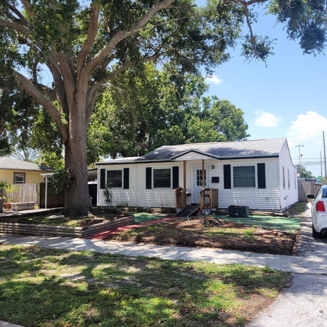 This home is freshly interior painted, new cabinets in kitchen and inside laundry room, new flooring throughout, and ceiling fans. Time to move in! The home is uniquely laid out with two bedrooms, family room, dining room and home office in the middle of the house. The property is a very nice size lot of 70x103.The rear of the home has a screened in sunroom/rear porch. The home is within walking distance of Speer YMCA, Northeast Park and also Cypress Links Golf Course. Great Area. Drive by and take a look. Professional pictures coming soon.