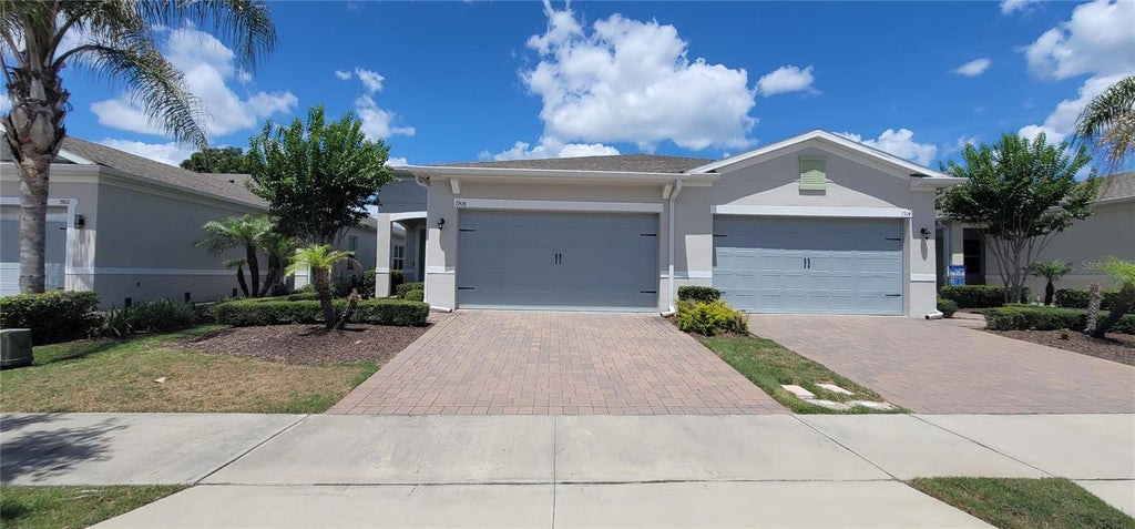 Photo of 1908 Flora Pass Place, Kissimmee, FL 34747 (MLS # O6437912)