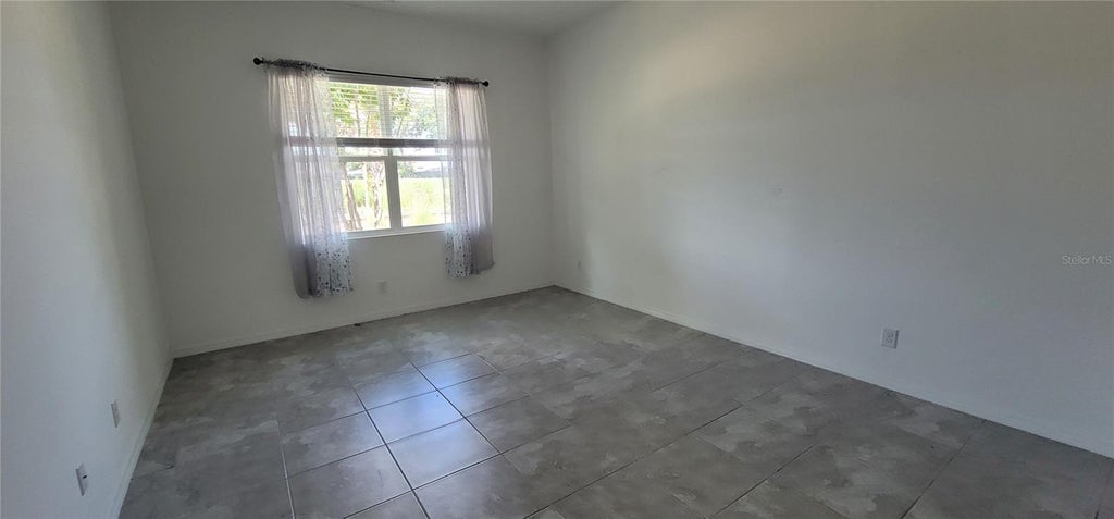 Photo of 1908 Flora Pass Place, Kissimmee, FL 34747 (MLS # O6437912)