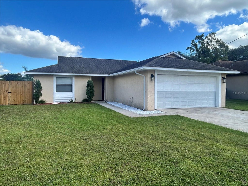 Photo of 33 S Palm Avenue, Kissimmee, FL 34741 (MLS # S5160242)