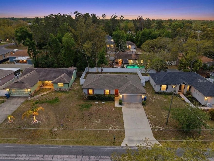 Welcome to this beautifully maintained 2020-built home in the desirable neighborhood Weeki Wachee Woodlands of Spring Hill! Offering 1,267 sq ft, this charming property features 3 bedrooms and 2 bathrooms with a layout designed for comfort and easy living! Sitting on a clean, level lot, NO HOA, Deed restrictions or Flood zone! The homes backyard is fully enclosed with a white PVC vinyl fencing, providing privacy and a crisp, modern look. Inside, you'll find carpeted bedrooms and living room for added comfort, paired with tile flooring in the kitchen, bathrooms, laundry room, and all wet areas for durability and style. The open floor plan creates a welcoming flow, and the light and bright kitchen is a standout--complete with a lovely window over the sink overlooking the backyard. In addition an interior laundry room that adds convenience and functionality. This home is truly move-in ready and perfect for a variety of buyers. Whether you're searching for a fantastic starter home, an income-producing property, or a comfortable place to downsize, this one checks all the boxes! Don't miss your chance--schedule your private tour today!