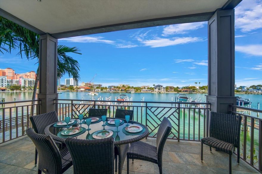RARE FIND – 2017 LUXURIOUS THREE-STORY WATERFRONT TOWNHOME with 3-day minimum rentals and no cap on frequency—offered fully furnished/turnkey. Includes a 39’ boat slip with water, electricity, WiFi, and swift access to the Gulf of Mexico, along with hurricane-impact glass and a spacious two-car garage for your vehicle and beach essentials.
Ideally located on postcard-worthy Brightwater Drive, just a 5-minute walk to Clearwater Beach, where soft, pristine white sand meets the sparkling Gulf. Enjoy effortless access to dining, shopping, and vibrant coastal living. Brightwater Blue is a premier waterfront community offering an onsite security guard, resort-style pool and spa, outdoor entertaining area with gas grills, and a beach rinse-off station.
The lower-level entry and two-car garage open into a spacious foyer/game/media room featuring a ping pong table, beverage bar, mounted TV and floor-to-ceiling multi-panel sliding glass doors that create a dramatic wall of glass, instantly framing tranquil water views. Designed to maximize both light and lifestyle, these expansive sliders flood the space with natural sunlight while seamlessly blending indoor and outdoor living.
The second-level main living area boasts 10-foot ceilings and a spacious Great Room, showcasing serene intracoastal views through additional floor-to-ceiling sliding glass doors. Step out to your private waterfront patio or simply open the doors to invite in the coastal breeze—perfect for entertaining or unwinding at sunset. Built with impact-rated glass, they provide both peace of mind and energy efficiency without compromising the view.
The open-concept kitchen is designed for effortless entertaining, featuring a center island, large breakfast bar, custom cabinetry, Silestone quartz countertops, and KitchenAid stainless steel appliances. This level also includes a convenient half bath and a separate laundry room with washer, dryer, utility sink, and ample storage.
Upstairs, the third floor offers an inviting primary suite with a private balcony overlooking the water, a spacious ensuite bath with dual sinks, water closet, and walk-in closet. Additional bedrooms are generously sized.
Discover your own private sanctuary on this picturesque beachside avenue—where morning walks to the shore, waterfront views, and the energy of nearby shops and restaurants create a lifestyle that feels both refined and effortlessly relaxed. With exceptional rental flexibility and strong income potential, this residence presents a rare opportunity to fully embrace the best of coastal living.