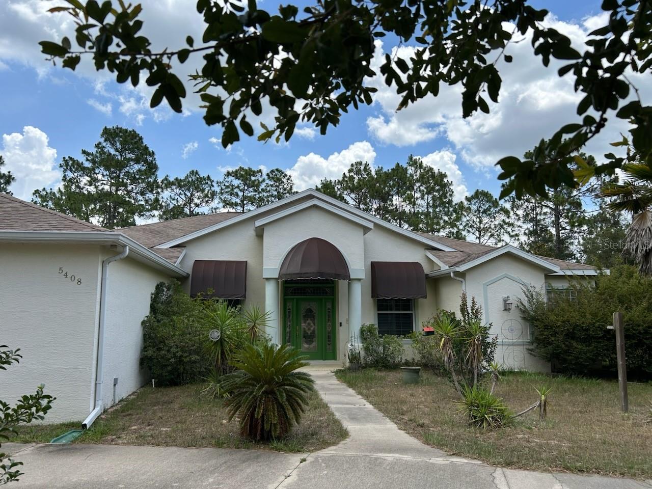 BRING ALL OFFERS! SELLERS MOTIVATED! Enjoy exceptional spaces for entertaining with a spacious formal dining room, expansive screened lanai, and beautiful inground pool. This well-maintained home features thoughtful upgrades throughout, a gourmet kitchen with granite countertops, a luxurious primary suite, and a three-car garage with circular driveway. Conveniently located near shopping and medical facilities. Experience the best of Citrus County living—renowned for its scenic waterways, boating, fishing, kayaking, and a wide variety of water activities
