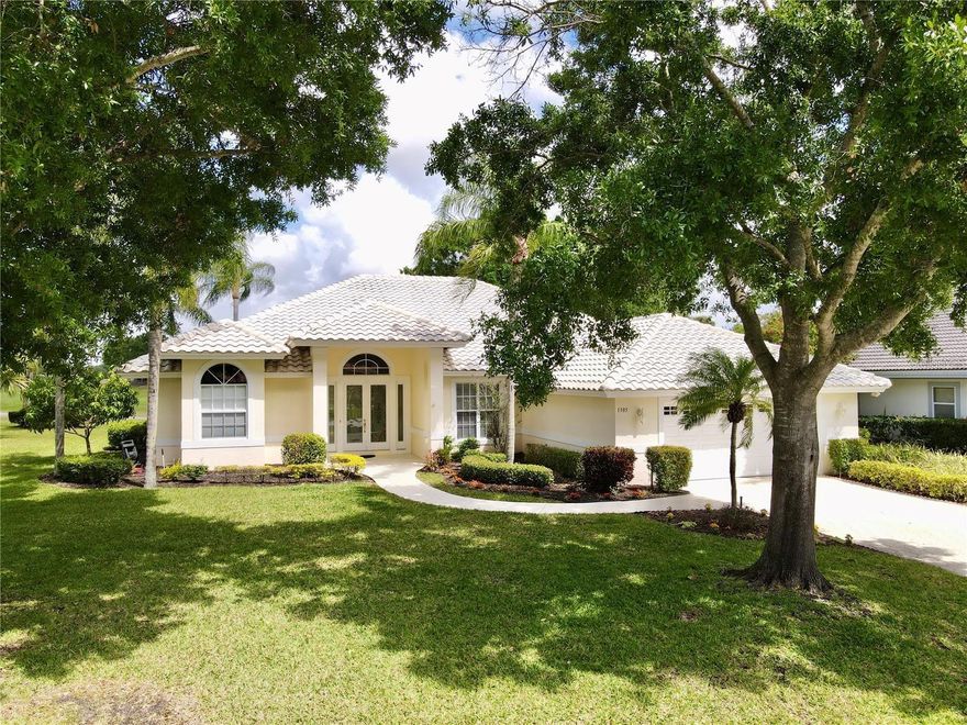 Amazing Home With Tranquil Views - ASSUMABLE must qualify Loan 2.99% 228K Balance! Enjoy Your Morning Coffee Partaking In Natures Glory - Overlooking The 4th Green! Golf Front - Pool Home...This Amazing Light And Bright Home Features Soaring 12' Ceilings, Natural Light Throughout, Updated Kitchen With Smooth Granite, Stainless Steel Appliances, Solar Tube, Tile Floors, New Laminate for Bedrooms, Cabinetry In Laundry, Split Floor Plan, Tons Of Storage And Closets, Pool Was Recently Resurfaced, Huge Lanai All Covered And Screened, Lush Landscaping And So Much More!