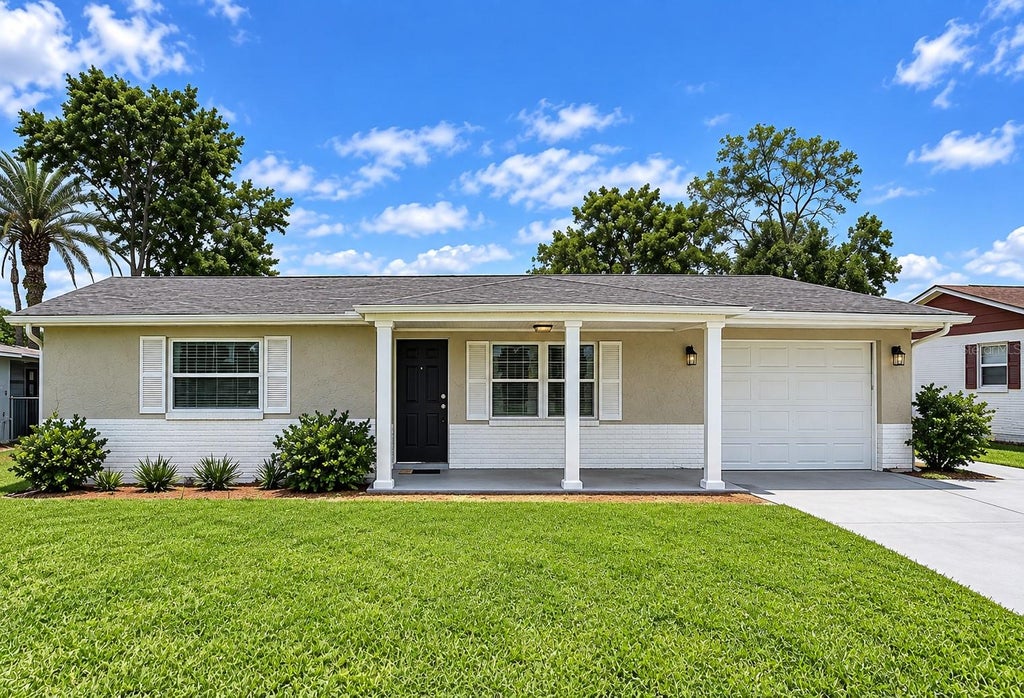 Photo of 7310 Ivanhoe Drive, Port Richey, FL 34668 (MLS # TB8551985)